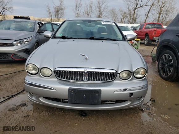 2005 Jaguar X-Type 3.0L with VIN SAJWA51A35WE55834, listed as a Copart auction lot 42930694 with NaN miles and Salvage Title. Bid and sale history available at carsss.com. Image 5.
