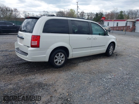 2010 Chrysler Town & Country Touring with VIN 2A4RR5D17AR463316, listed as a IAAI auction lot 42075932 with 260,617 mi miles. Bid and sale history available at carsss.com. Image 4.