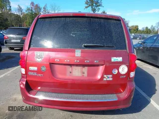 2014 Dodge Grand Caravan SXT with VIN 2C4RDGCG8ER311850, listed as a IAAI auction lot 40598088 with 138,010 mi miles and . Bid and sale history available at DreamBid. Image 16.