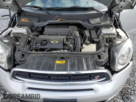 2016 MINI Countryman S with VIN WMWZC3C58GWT08173, listed as a Copart auction lot 44627235 with 76,814 mi miles and Salvage title. Bid and sale history available at DreamBid. Image 13.