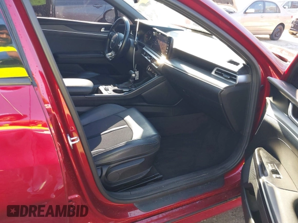 2022 Kia K5 GT-Line z VIN 5XXG64J26NG107886, wystawiony jako IAAI lot #41054102 z przebiegiem 88 516 mil mil oraz . Historia ofert i sprzedaży dostępna na DreamBid. Obrazek 5.