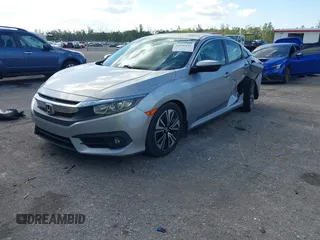 2017 Honda Civic EX-T with VIN 19XFC1F39HE001756, listed as a IAAI auction lot 42030331 with 44,056 mi miles. Bid and sale history available at carsss.com. Image 17.