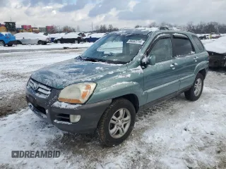 2005 Kia Sportage LX with VIN KNDJF723X57125430, listed as a Copart auction lot 86552714 with Not Provided miles and Salvage Title. Bid and sale history available at carsss.com. Image 1.