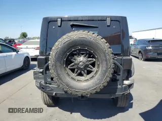 2013 Jeep Wrangler Unlimited Rubicon 10th Anniversary with VIN 1C4HJWFG4DL550832, listed as a Copart auction lot 71633684 with 60,759 mi miles and Salvage title. Bid and sale history available at DreamBid. Image 6.