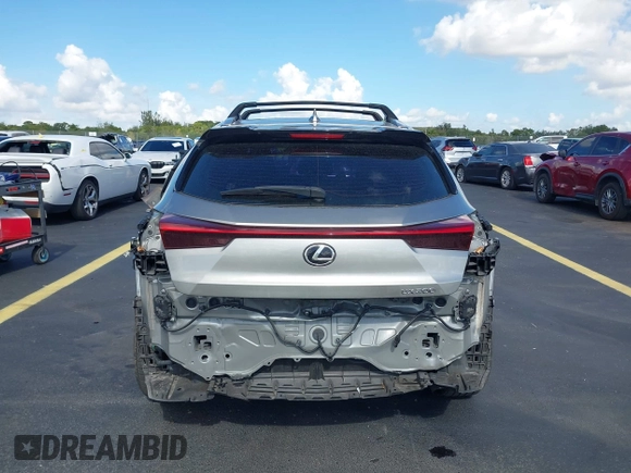 2022 Lexus UX 200 F Sport z VIN JTHE3JBH9N2048306, wystawiony jako IAAI lot #42516590 z przebiegiem 73 139 mil mil oraz . Historia ofert i sprzedaży dostępna na DreamBid. Obrazek 17.