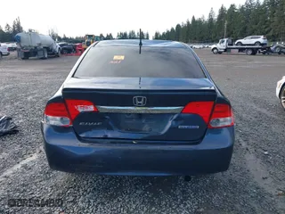 2009 Honda Civic Hybrid with VIN JHMFA36209S008939, listed as a IAAI auction lot 41798952 with 163,650 mi miles. Bid and sale history available at carsss.com. Image 16.