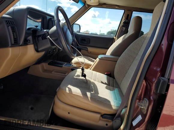 2001 Jeep Cherokee Sport with VIN 1J4FT48S21L538823, listed as a Copart auction lot 56385885 with 157,808 mi miles and Clean title. Bid and sale history available at DreamBid. Image 7.