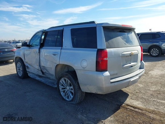 2020 Chevrolet Tahoe LT with VIN 1GNSCBKC5LR226822, listed as a IAAI auction lot 41334853 with 77,091 mi miles. Bid and sale history available at carsss.com. Image 3.
