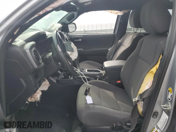 2019 Toyota Tacoma SR with VIN 3TMCZ5AN2KM193701, listed as a Copart auction lot 56776385 with 112,990 mi miles and Salvage title. Bid and sale history available at DreamBid. Image 7.