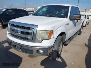 2013 Ford F-150 XL with VIN 1FTFW1CF2DKE62990, listed as a IAAI auction lot 41767912 with 257,503 mi miles. Bid and sale history available at carsss.com. Image 2.