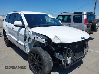 2018 Jeep Grand Cherokee Altitude with VIN 1C4RJEAG2JC404009, listed as a IAAI auction lot 42691304 with 60,948 mi miles and . Bid and sale history available at DreamBid. Image 6.