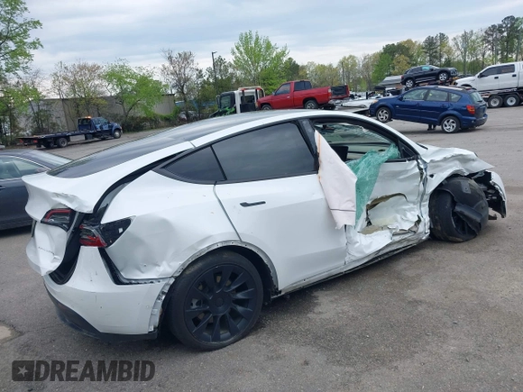 2021 Tesla Model Y Long Range with VIN 5YJYGDEE5MF232790, listed as a IAAI auction lot 41900175 with Not Provided miles. Bid and sale history available at carsss.com. Image 4.