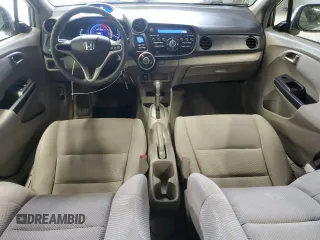 2010 Honda Insight LX z VIN JHMZE2H5XAS018546, wystawiony jako Copart lot #61411545 z przebiegiem 55 814 mil mil oraz Czysty tytuł • Clean title. Historia ofert i sprzedaży dostępna na DreamBid. Obrazek 8.