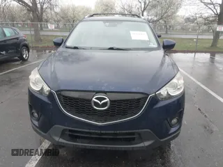 2014 Mazda CX-5 Grand Touring with VIN JM3KE4DY8E0366644, listed as a IAAI auction lot 41971438 with 135,644 mi miles and . Bid and sale history available at carsss.com. Image 12.