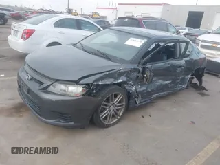 2013 Scion tC with VIN JTKJF5C76D3050374, listed as a IAAI auction lot 42024870 with 99,233 mi miles. Bid and sale history available at carsss.com. Image 2.