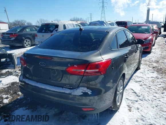 2016 Ford Focus SE with VIN 1FADP3F27GL257596, listed as a IAAI auction lot 41619509 with 75,606 mi miles. Bid and sale history available at carsss.com. Image 4.