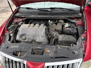 2010 Lincoln MKS z VIN 1LNHL9DR0AG603509, wystawiony jako Copart lot #60124735 z przebiegiem 181 076 mil mil oraz Czysty tytuł • Clean title. Historia ofert i sprzedaży dostępna na DreamBid. Obrazek 7.