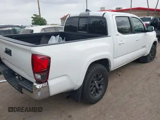 2021 Toyota Tacoma SR with VIN 3TYAX5GN6MT018475, listed as a IAAI auction lot 41966835 with 42,780 mi miles and . Bid and sale history available at DreamBid. Image 4.