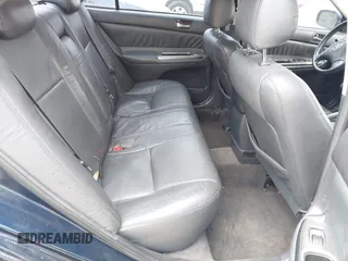 2003 Toyota Camry LE with VIN 4T1BE32K13U241259, listed as a IAAI auction lot 41907480 with 281,229 mi miles and . Bid and sale history available at DreamBid. Image 8.