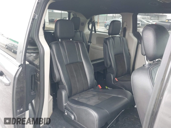 2019 Dodge Grand Caravan SXT with VIN 2C4RDGCG3KR543221, listed as a IAAI auction lot 41528859 with 129,778 mi miles and . Bid and sale history available at DreamBid. Image 8.