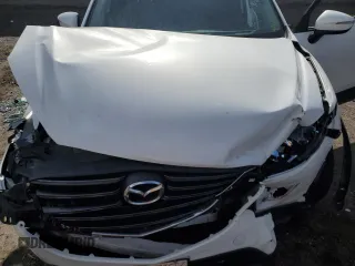 2016 Mazda CX-5 Grand Touring with VIN JM3KE2DY0G0888854, listed as a Copart auction lot 68379754 with 73,096 mi miles and Salvage Title. Bid and sale history available at carsss.com. Image 13.