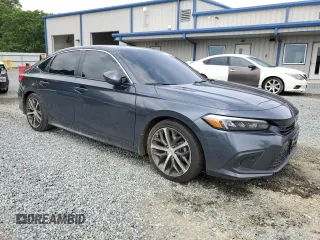 2024 Honda Civic Touring z VIN 2HGFE1F96RH324748, wystawiony jako Copart lot #58833725 z przebiegiem Nie podano mil oraz Szkoda całkowita • Salvage title. Historia ofert i sprzedaży dostępna na DreamBid. Obrazek 4.