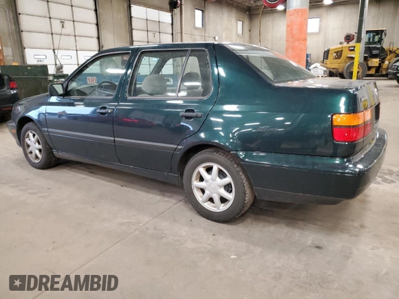1998 Volkswagen Jetta z VIN 3VWSA81H5WM126169, wystawiony jako Copart lot #84884894 z przebiegiem 32 759 mil mil oraz Czysty tytuł • Clean title. Historia ofert i sprzedaży dostępna na DreamBid. Obrazek 2.