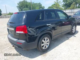 2013 Kia Sorento LX with VIN 5XYKT3A19DG381288, listed as a IAAI auction lot 42797647 with 220,000 mi miles and . Bid and sale history available at DreamBid. Image 4.