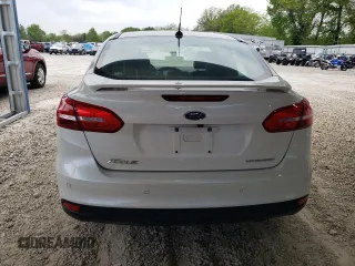 2018 Ford Focus Titanium с VIN 1FADP3J23JL246545, выставлен на аукционе Copart как лот 54838735 с пробегом 85 507 миль миль и Списание • Salvage title. История ставок и продаж доступна на DreamBid. Изображение 6.