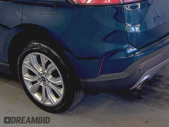 2020 Ford Edge Titanium z VIN 2FMPK3K91LBB37761, wystawiony jako IAAI lot #42829390 z przebiegiem 90 117 mil mil oraz . Historia ofert i sprzedaży dostępna na DreamBid. Obrazek 1.