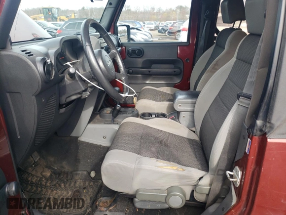 2007 Jeep Wrangler X with VIN 1J4FA24147L160102, listed as a Copart auction lot 52001105 with 219,939 mi miles and Clean Title. Bid and sale history available at carsss.com. Image 7.