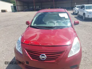 2012 Nissan Versa SV with VIN 3N1CN7AP7CL816930, listed as a IAAI auction lot 42070938 with 116,541 mi miles. Bid and sale history available at carsss.com. Image 6.
