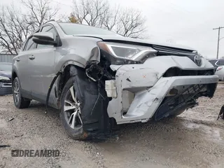 2018 Toyota RAV4 XLE with VIN 2T3RFREV1JW842728, listed as a IAAI auction lot 41519668 with 149,670 mi miles. Bid and sale history available at carsss.com. Image 6.