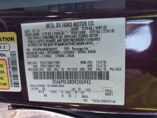 2013 Ford Fusion SE Hybrid with VIN 3FA6P0LU8DR206943, listed as a IAAI auction lot 41822643 with 141,484 mi miles. Bid and sale history available at carsss.com. Image 9.