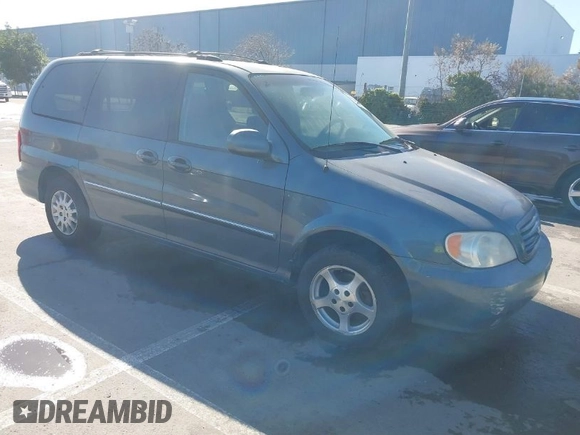 2002 Kia Sedona LX with VIN KNDUP131826297204, listed as a IAAI auction lot 41510393 with 136,337 mi miles. Bid and sale history available at carsss.com. Image 1.