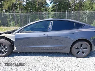 2023 Tesla Model 3 z VIN 5YJ3E1EA6PF650212, wystawiony jako IAAI lot #42554747 z przebiegiem 49 838 mil mil oraz . Historia ofert i sprzedaży dostępna na DreamBid. Obrazek 15.