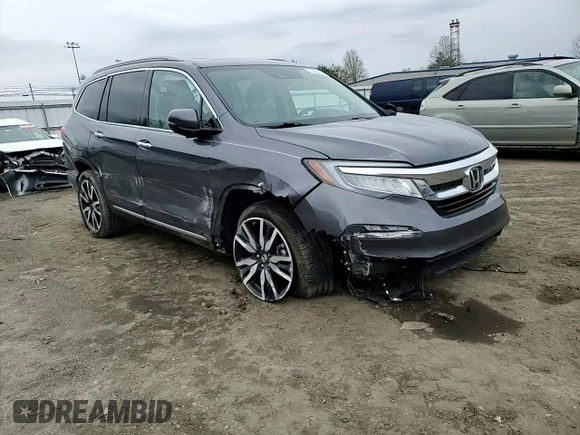 2020 Honda Pilot Touring 7-Passenger z VIN 5FNYF6H69LB005829, wystawiony jako Copart lot #52702555 z przebiegiem 90 746 mil mil oraz Szkoda całkowita • Salvage title. Historia ofert i sprzedaży dostępna na DreamBid. Obrazek 12.