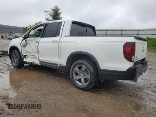 2023 Honda Ridgeline RTL-E with VIN 5FPYK3F78PB015187, listed as a Copart auction lot 57655465 with 57,704 mi miles and Salvage title. Bid and sale history available at DreamBid. Image 2.
