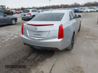 2014 Cadillac ATS Standard AWD with VIN 1G6AG5RX9E0179422, listed as a IAAI auction lot 41826487 with 121,061 mi miles and . Bid and sale history available at carsss.com. Image 4.