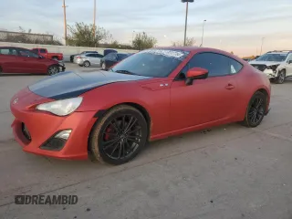 2014 Scion FR-S with VIN JF1ZNAA15E9703625, listed as a Copart auction lot 80127784 with 74,927 mi miles and Salvage Title. Bid and sale history available at DreamBid. Image 1.