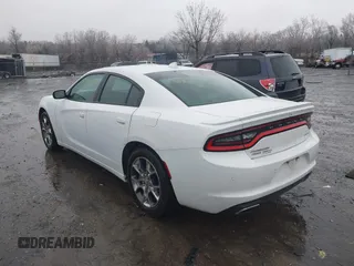 2015 Dodge Charger SXT with VIN 2C3CDXJG3FH746506, listed as a IAAI auction lot 41463713 with 130,687 mi miles. Bid and sale history available at carsss.com. Image 3.