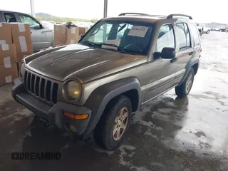 2003 Jeep Liberty Sport with VIN 1J4GK48K13W633818, listed as a IAAI auction lot 41962552 with 217,884 mi miles and . Bid and sale history available at DreamBid. Image 2.