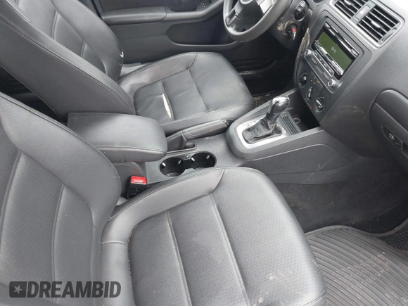 2014 Volkswagen Jetta SE z VIN 3VWD07AJ6EM294202, wystawiony jako IAAI lot #42364119 z przebiegiem 77 393 mil mil oraz . Historia ofert i sprzedaży dostępna na DreamBid. Obrazek 5.