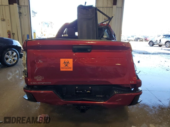 2023 Chevrolet Colorado 4WD LT z VIN 1GCPTCEK1P1198948, wystawiony jako Copart lot #49230845 z przebiegiem Nie podano mil oraz Nie do naprawy. Historia ofert i sprzedaży dostępna na DreamBid. Obrazek 6.