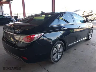 2013 Hyundai Sonata Hybrid with VIN KMHEC4A44DA064673, listed as a IAAI auction lot 41267954 with 178,562 mi miles. Bid and sale history available at carsss.com. Image 4.