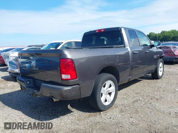 2014 Ram 1500 Express with VIN 1C6RR6FT7ES457263, listed as a IAAI auction lot 42601014 with 165,734 mi miles and . Bid and sale history available at DreamBid. Image 4.