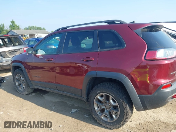 2019 Jeep Cherokee Trailhawk with VIN 1C4PJMBX5KD421043, listed as a IAAI auction lot 42570336 with 114,463 mi miles and . Bid and sale history available at DreamBid. Image 13.