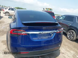 2018 Tesla Model X 75D with VIN 5YJXCAE21JF132628, listed as a IAAI auction lot 42081282 with 35,360 mi miles and . Bid and sale history available at carsss.com. Image 16.