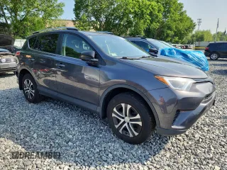 2017 Toyota RAV4 LE with VIN JTMBFREV5HJ146464, listed as a Copart auction lot 61841125 with 125,365 mi miles and Salvage title. Bid and sale history available at DreamBid. Image 4.