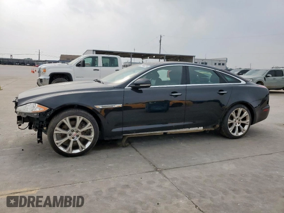 2015 Jaguar XJ with VIN SAJWA1CZ8F8V85381, listed as a Copart auction lot 57464225 with 161,938 mi miles and Salvage Title. Bid and sale history available at DreamBid. Image 1.